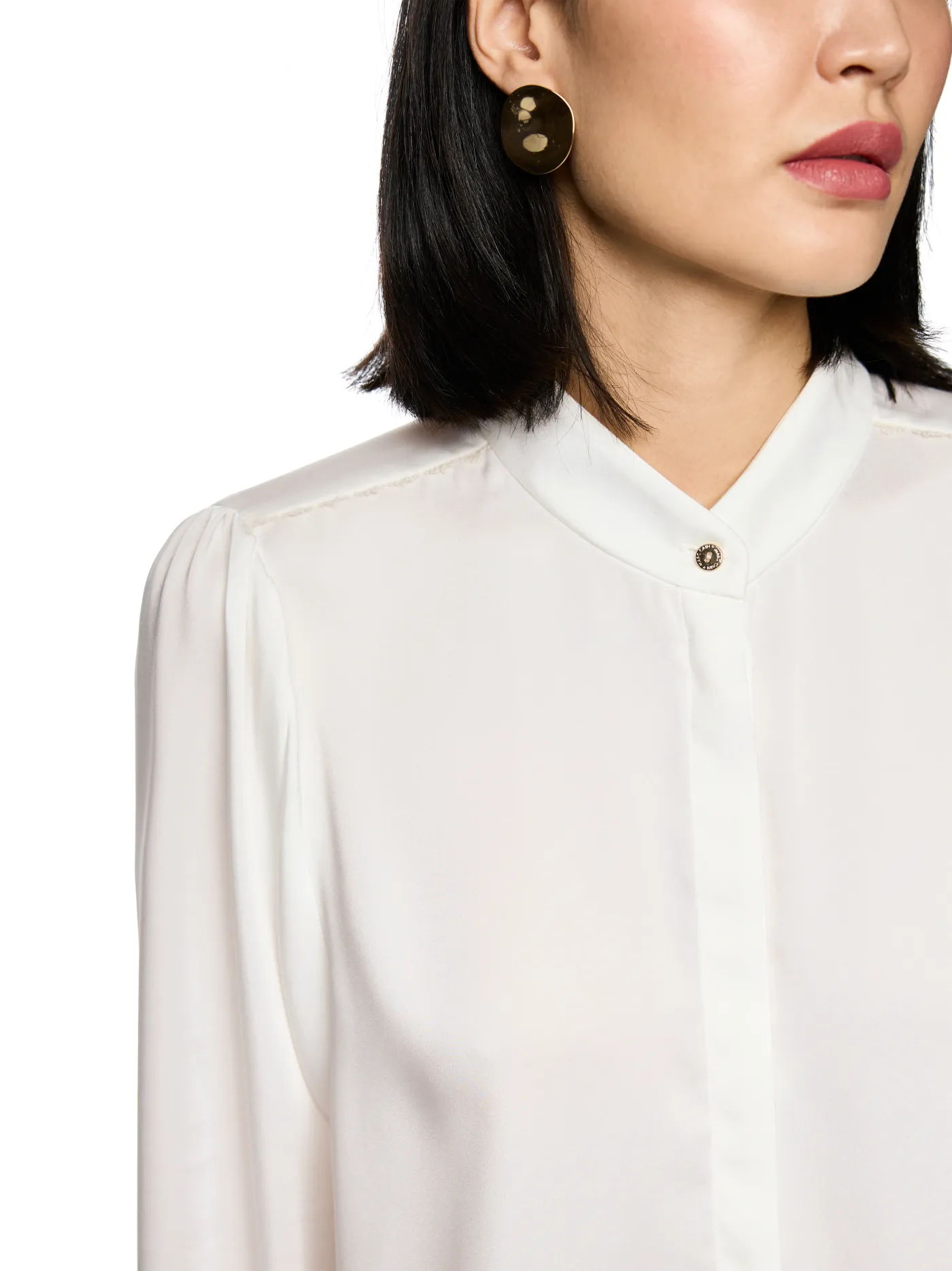 Bluse mit Spitzendetails und Stehkragen